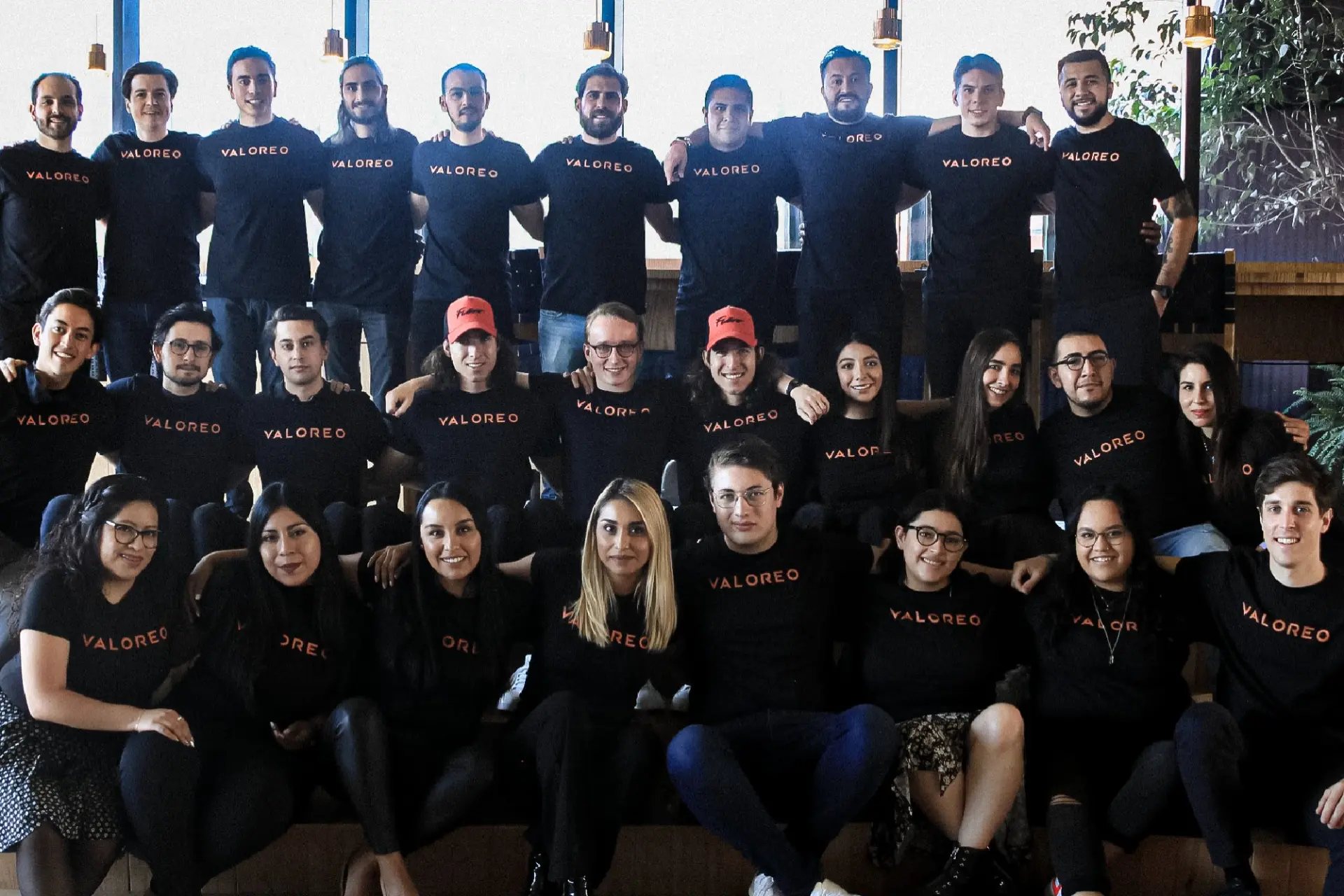 The VALOREO team in black VALOREO shirts